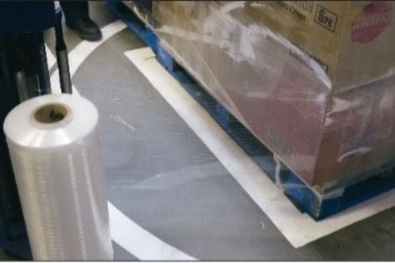 Pallet being wrapped with plastic film